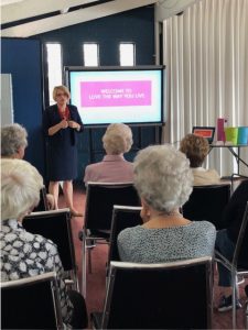 Jenny Vile presenting talk to group of ladies