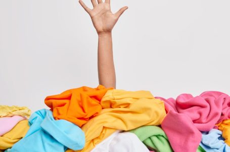 Clothing clutter hand up - linkedin